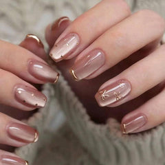 Nude Press-On Nails with Gold Marble Design Wearing - 24 Piece Set for a Sophisticated Look - Passion Pulse Adult