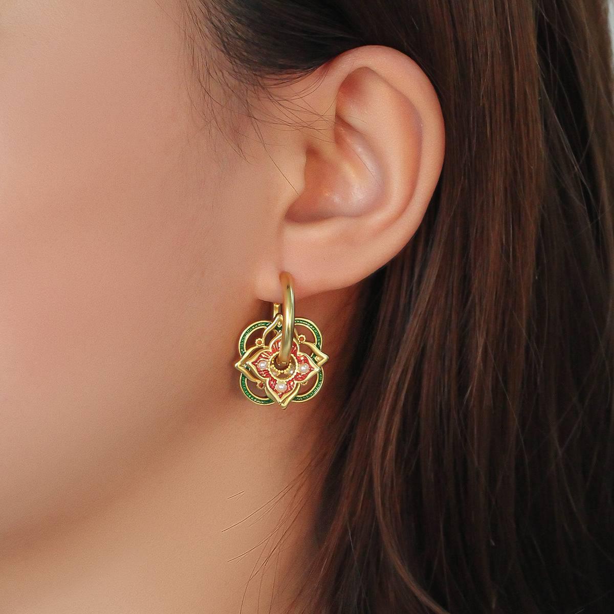 Wear multiple pairs of Chinese-style earrings. - Passion Pulse Adult